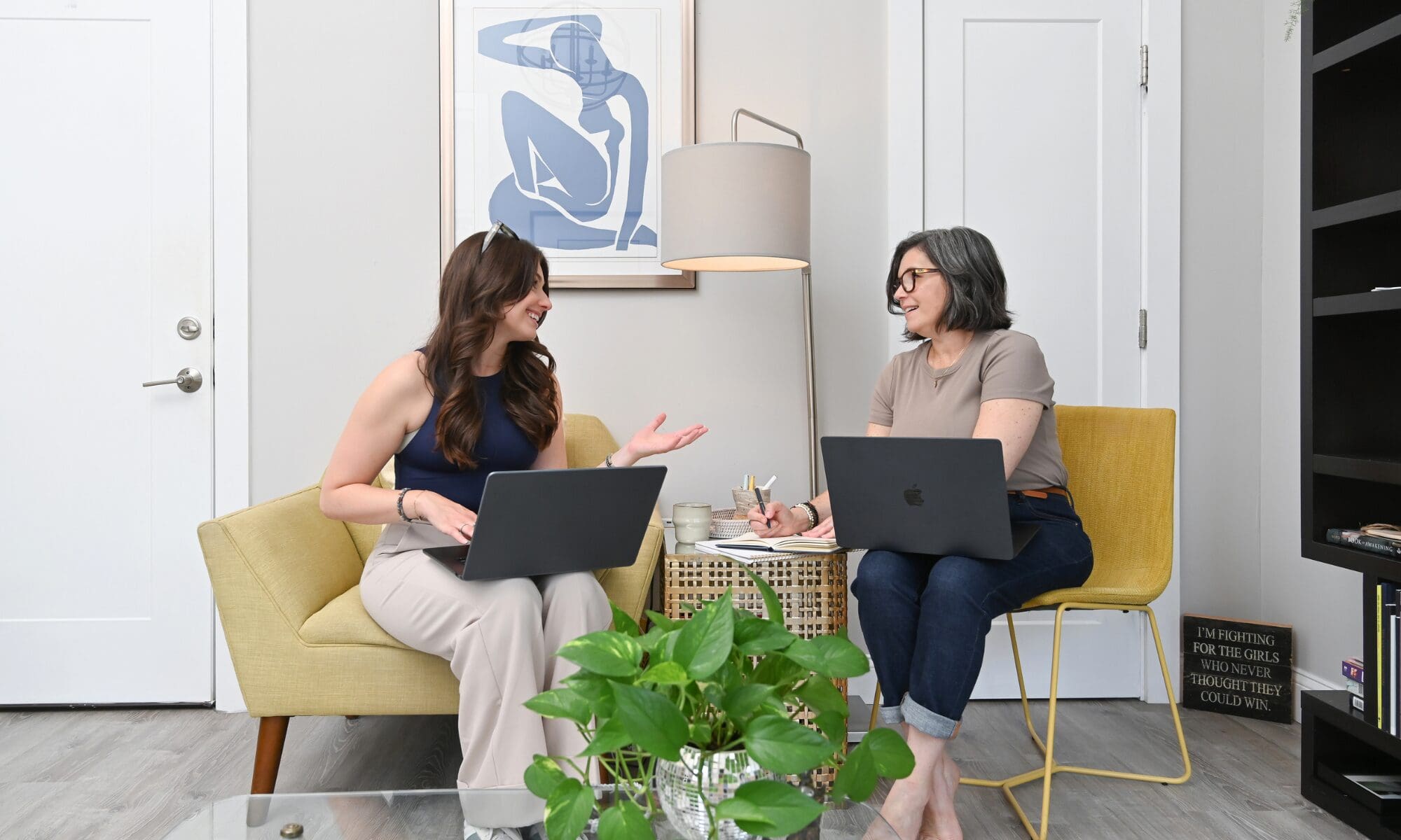 Small business women, military spouse, sitting in office